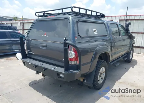 2015 Toyota Tacoma Base V6 z USA, uszkodzony, nr VIN 5TFLU4EN0FX145357